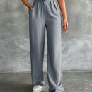 Pantalones altos de pierna ancha con pliegues