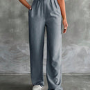 Pantalones altos de pierna ancha con pliegues