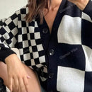 Nuevos llegados de otono/invierno sueter cardigan de punto asimetrico de manga larga con estampado a cuadros blanco y negro casual y de moda para mujer, con tejido reforzado