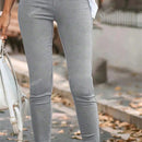 Pantalones casuales acortados de mujer de unicolor con bolsillos elasticos, con cremallera decorativa