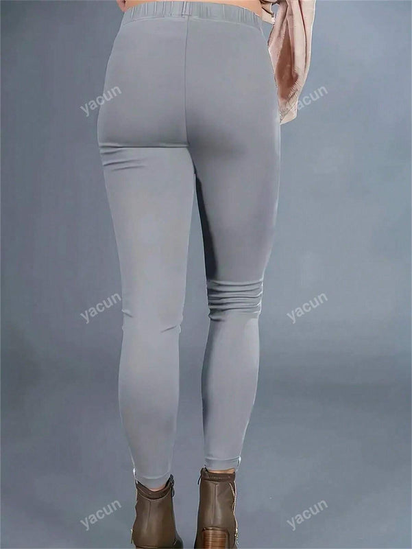 Pantalones casuales acortados de mujer de unicolor con bolsillos elasticos, con cremallera decorativa