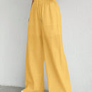 Pantalones sueltos de pierna ancha de color solido para mujer con dobladillo fluido, estilo casual