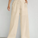 Pantalones sueltos de pierna ancha de color solido para mujer con dobladillo fluido, estilo casual