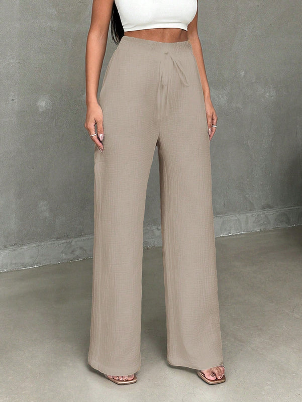 Pantalones casuales de mujer con cintura elastica de cordon y ajuste holgado con bolsillos inclinados