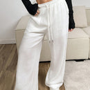 Pantalones sueltos de pierna ancha de color solido para mujer con dobladillo fluido, estilo casual