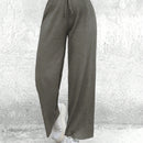 Cottnline pantalones informales minimalistas con nudo delantero de unicolor de algodon