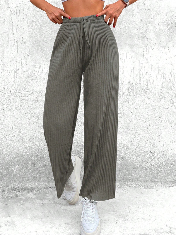 Cottnline pantalones informales minimalistas con nudo delantero de unicolor de algodon