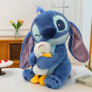 Muñeco de Peluche de Stitch de Disney con Patito - Muñeca Azul de Dibujos Animados Linda, Kawaii para Decoración, Adorno para el Coche, Regalo Ideal para Cumpleaños, Navidad, Halloween, Pascua