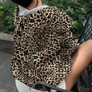 Muchic sudadera con capucha con estampado de leopardo minimalista informal, impreso en toda la prenda, otono invierno