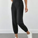 Pantalones jogger de unicolor con detalle en la cintura para mujer