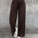 Cottnline pantalones informales minimalistas con nudo delantero de unicolor de algodon