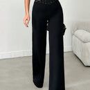 Tejido de lycra punto suelto negro, pantalon ancho cinturon elastico raya semitransparente y cintura en forma de v
