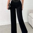 Tejido de lycra punto suelto negro, pantalon ancho cinturon elastico raya semitransparente y cintura en forma de v