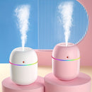 Un humidificador con alimentación USB adecuado para dormitorios, salas de estar, escritorios y automóviles, con luz ambiental, aerosol de aromaterapia y un diseño afortunado: portátil.