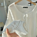 Frenchy cardigan de punto unicolor de color rosa palido con cinturon delantero, se puede usar sobre una camiseta