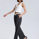 Pantalones de pierna ancha con bolsillo, cintura con cordon y estampado a rayas en color contrastante