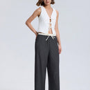 Pantalones de pierna ancha con bolsillo, cintura con cordon y estampado a rayas en color contrastante