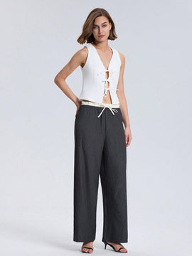 Pantalones de pierna ancha con bolsillo, cintura con cordon y estampado a rayas en color contrastante