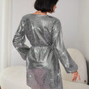 Vestido de mujer con mangas farol brillantes