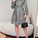Vestido de mujer con mangas farol brillantes
