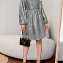 Vestido de mujer con mangas farol brillantes