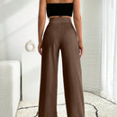 Pantalon palazzo de pierna ancha blanco con detalle de boton