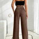 Pantalon palazzo de pierna ancha blanco con detalle de boton