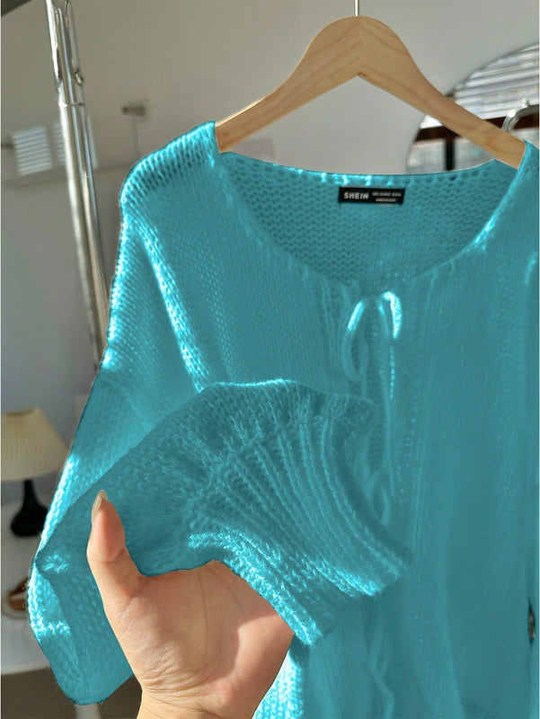 Frenchy cardigan de punto unicolor de color rosa palido con cinturon delantero, se puede usar sobre una camiseta