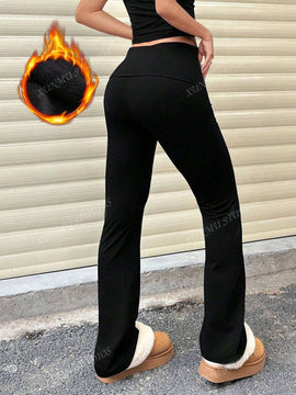 Pantalones de yoga de corte acampanado ajustados de cintura alta de unicolor minimalista de moda para mujeres