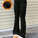 Pantalones de yoga de corte acampanado ajustados de cintura alta de unicolor minimalista de moda para mujeres
