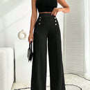 Pantalon palazzo de pierna ancha blanco con detalle de botones