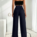 Pantalon palazzo de pierna ancha blanco con detalle de boton