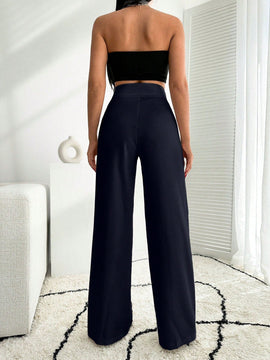 Pantalon palazzo de pierna ancha blanco con detalle de boton