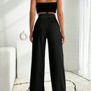 Pantalon palazzo de pierna ancha blanco con detalle de boton