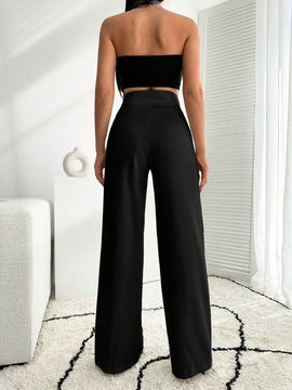 Pantalon palazzo de pierna ancha blanco con detalle de boton