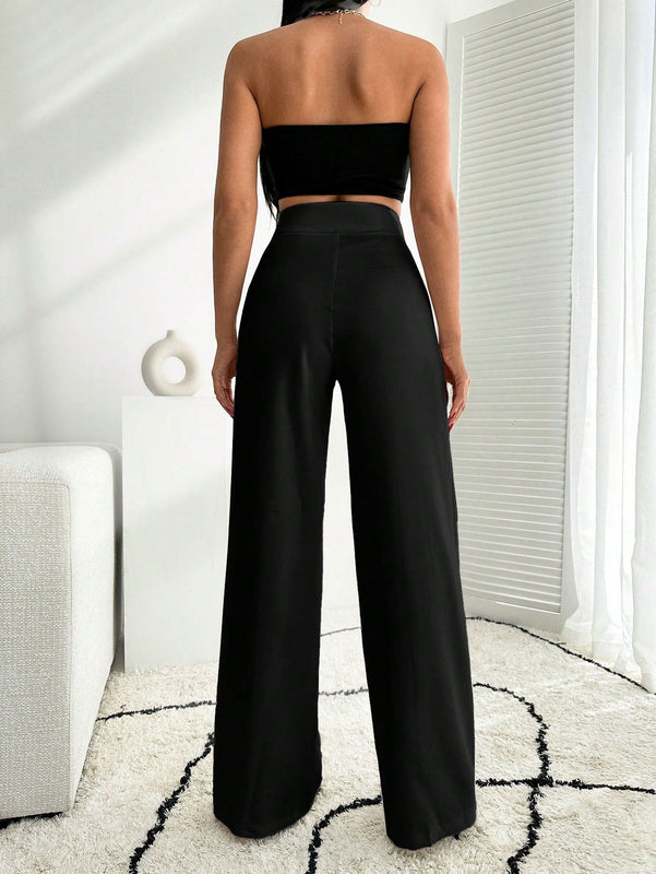 Pantalon palazzo de pierna ancha blanco con detalle de boton