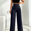 Pantalon palazzo de pierna ancha blanco con detalle de boton