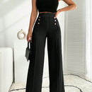 Pantalon palazzo de pierna ancha blanco con detalle de boton