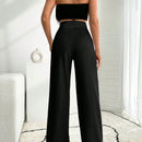Pantalon palazzo de pierna ancha blanco con detalle de boton
