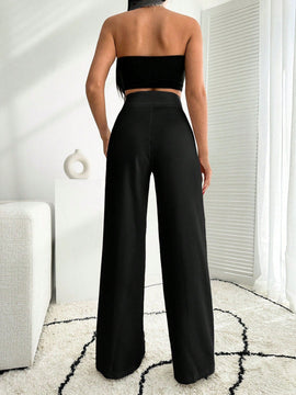 Pantalon palazzo de pierna ancha blanco con detalle de boton