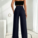 Pantalon palazzo de pierna ancha blanco con detalle de boton