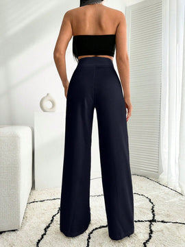 Pantalon palazzo de pierna ancha blanco con detalle de boton