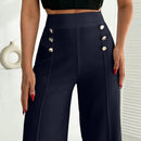 Pantalon palazzo de pierna ancha blanco con detalle de boton