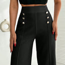 Pantalon palazzo de pierna ancha blanco con detalle de boton