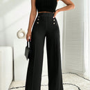 Pantalon palazzo de pierna ancha blanco con detalle de boton