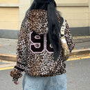 Muchic sudadera con capucha con estampado de leopardo minimalista informal, impreso en toda la prenda, otono invierno