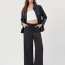 Pantalones sueltos de pierna ancha de color solido para mujer con dobladillo fluido, estilo casual