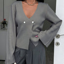 Cardigan de mujer de unicolor, con cuello en v, abotonadura delante y hombros caidos