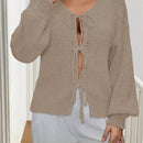 Frenchy cardigan de punto unicolor de color rosa palido con cinturon delantero, se puede usar sobre una camiseta