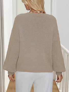 Frenchy cardigan de punto unicolor de color rosa palido con cinturon delantero, se puede usar sobre una camiseta